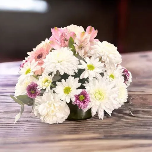 Centro de mesa con flores de estacion 